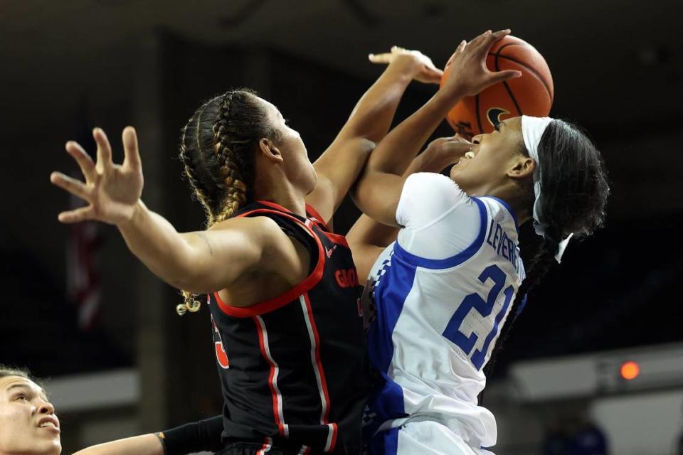 Kentucky’s Nyah Leveretter, right, shoots while defended by Georgia’s Diamond Battles during a game at Memorial Coliseum on Feb. 16, 2023.