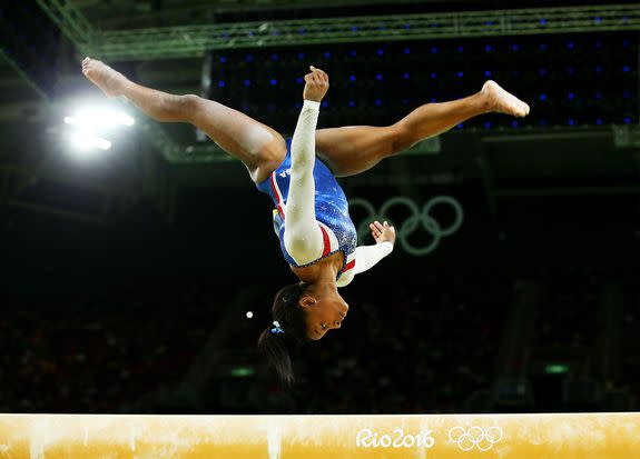 RIO DE JANEIRO, BRAZIL - AUGUST 11: Simone Biles of the United States competes on the balance beam during the Women's Individual All Around Final on Day 6 of the 2016 Rio Olympics at Rio Olympic Arena on August 11, 2016 in Rio de Janeiro, Brazil. (Photo by Alex Livesey/Getty Images)