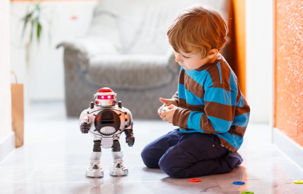 Social interactions with parents, friends and teachers can have profound impacts on a child's learning, development and understanding. What if some of those interactions are with AI systems? (Shutterstock)