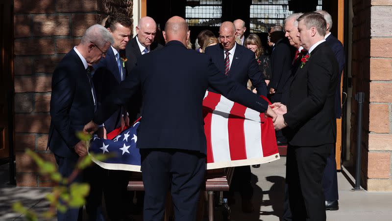 A U.S. flag is draped over the casket during the funeral for President M. Russell Ballard of The Church of Jesus Christ of Latter-day Saints at the Salt Lake Tabernacle in Salt Lake City on Friday, Nov. 17, 2023.