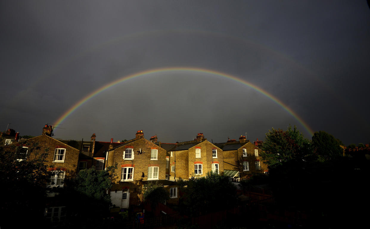 rent  double rainbow is seen above a row of terrace houses in Clapham, south London, Britain in this file photograph dated September 1, 2015. Rents in London have risen so sharply that the one group of young workers usually immune to worries about keeping a roof over their heads are starting to feel the pinch.  REUTERS/Dylan Martinez/files       