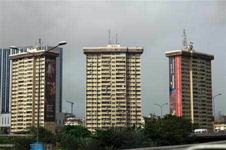 Property is seen along a road in the Ikoyi district in Nigeria's commercial capital Lagos September 10, 2013. REUTERS/Akintunde Akinleye