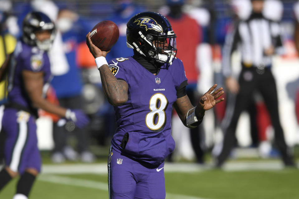 Baltimore Ravens quarterback Lamar Jackson looks to throw a pass against the New York Giants during the first half of an NFL football game, Sunday, Dec. 27, 2020, in Baltimore. (AP Photo/Nick Wass)