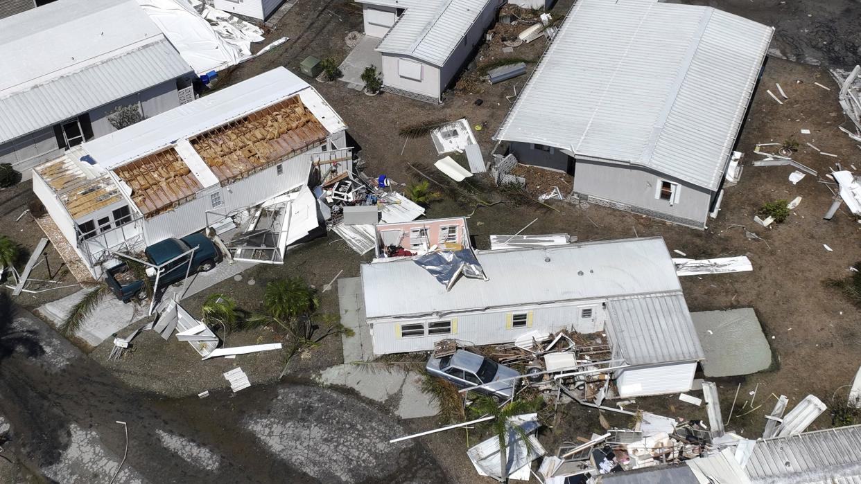 Damage to a trailer park is seen after Hurricane Ian passed by the area Saturday, Oct. 1, 2022, in Fort Myers, Fla.