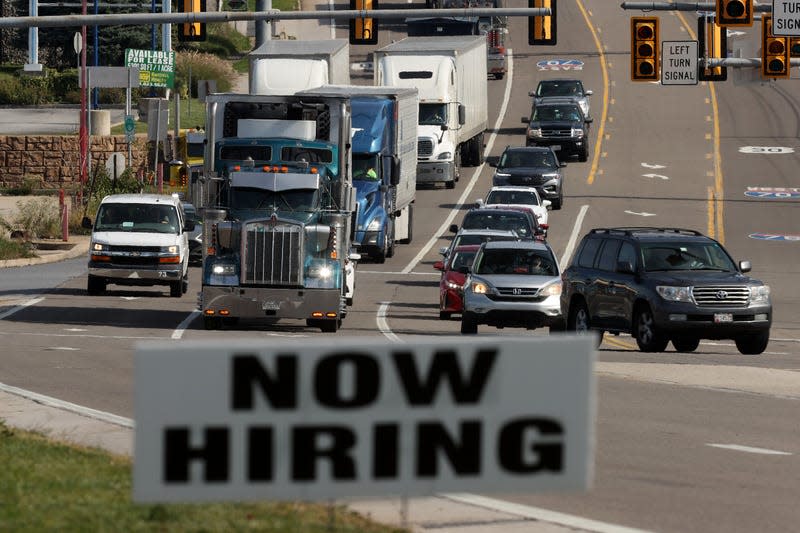 Semi-trailer trucks move along Lincoln Highway while using the indirect interchange from Interstates 70, the Pennsylvania Turnpike and U.S. Route 30 on October 14, 2021 in Breezewood, Pennsylvania.