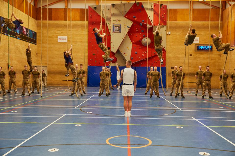 The recruits learn how to do rope climbs