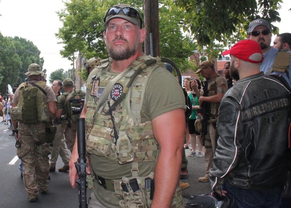 <div class="inline-image__caption"><p>A Three Percenter anti-government militia member stands guard during the Unite the Right rally in Charlottesville, Virginia, in 2017.</p></div> <div class="inline-image__credit">Michael Gould-Wartofsky</div>