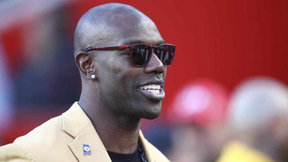 Former NFL wide receiver Terrell Owens is shown before an NFL football game between the San Francisco 49ers and the Oakland Raiders in Santa Clara, Calif., on Nov. 1, 2018. Owens said a fight caught on camera in which he punched a man in a CVS parking lot was the result of an “aggressor” threatening him and a fan he was talking to at the California store on Saturday, Nov. 26, 2022. (AP Photo/Ben Margot, File)