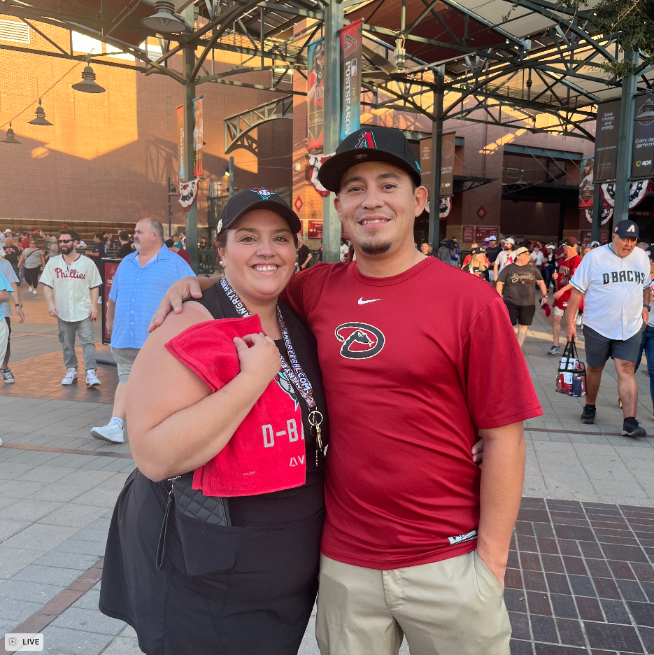 Brittany Cassidy and Alex Jessr pose for a photo after the Diamondbacks won Game 3 against the Phillies on Oct. 19, 2023.