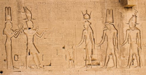 <span class="caption">The south wall of the temple of Hathor at Dendera. Cleopatra and her son Caesarian are depicted on the left side</span> <span class="attribution"><a class="link " href="https://www.shutterstock.com/image-photo/south-wall-temple-hathor-dendera-lionheaded-517009051" rel="nofollow noopener" target="_blank" data-ylk="slk:from www.shutterstock.com;elm:context_link;itc:0;sec:content-canvas">from www.shutterstock.com</a></span>