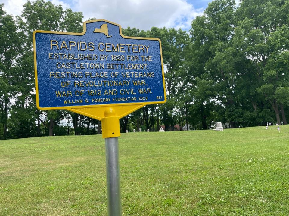 A historical marker for Rapids Cemetery on Congress Avenue in southwest Rochester.