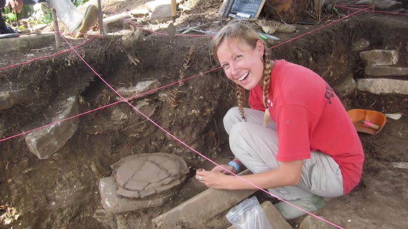 Archeologist Amy Thompson excavates at the ancient Maya site of Uxbenka