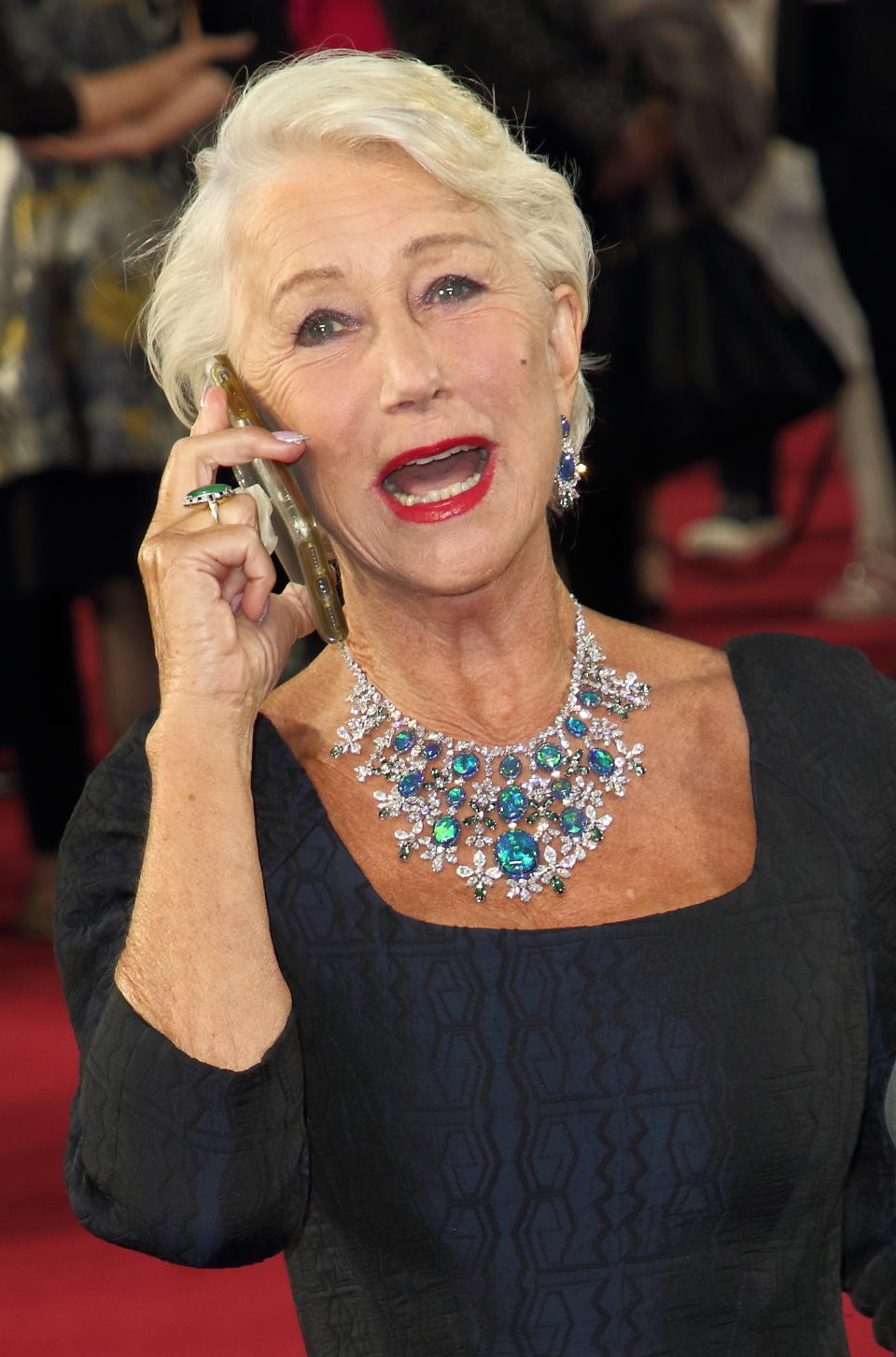 LONDON, UNITED KINGDOM - 2019/09/25: Dame Helen Mirren gets a call from her agent on the red carpet at the Sky Atlantic launch of their new TV series Catherine The Great at the Curzon Mayfair, London. (Photo by Keith Mayhew/SOPA Images/LightRocket via Getty Images)