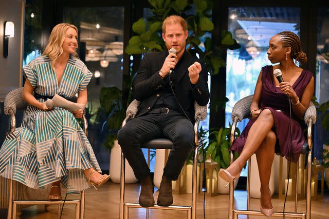 <p>Jason Koerner/Getty</p> Alix Lebec, Prince Harry and Dr. Sophie Chandauka speak at Sentebale panel in Miami on April 11, 2024