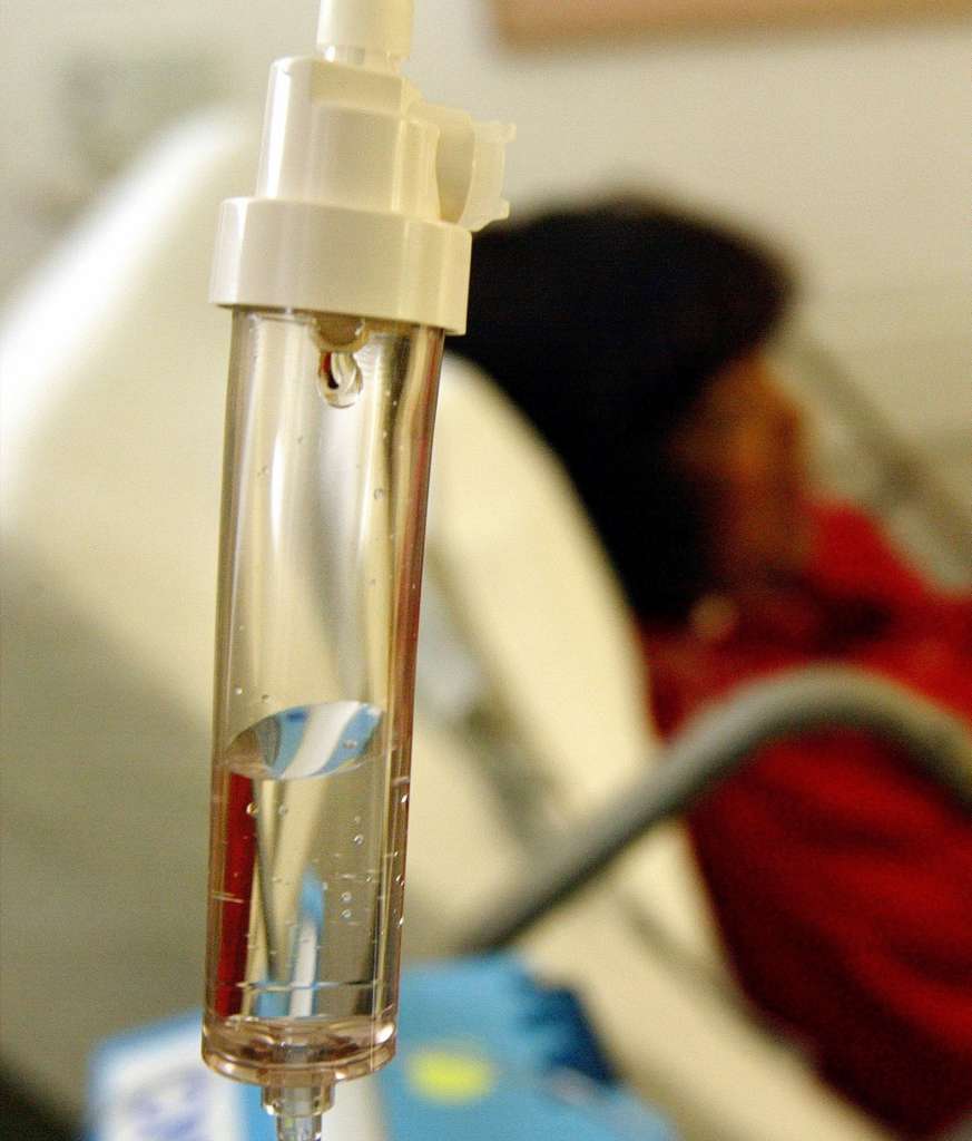 A breast cancer patient receives chemotherapy