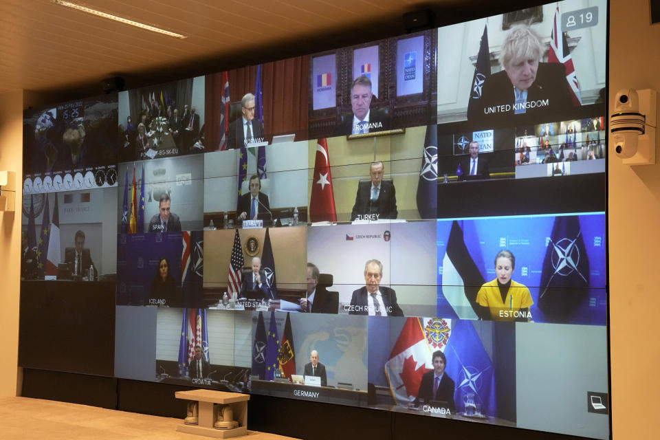 A screen shows leader during a video-conference of NATO members at the French Army headquarters, Friday, Feb. 25, 2022 in Paris. NATO leaders met to discuss how far they can go to challenge Russian President Vladimir Putin without engaging Russian forces in direct war. (AP Photo/Michel Euler, Pool)