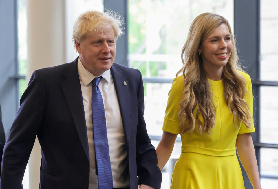 Prime Minister Boris Johnson and his wife Carrie Johnson attend the Commonwealth Heads of Government Meeting (CHOGM) opening ceremony at Kigali Convention Centre, Rwanda. Picture date: Friday June 24, 2022.