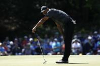 Tiger Woods of the U.S. reacts to a putt on the 15th green during first round play of the 2018 Masters golf tournament at the Augusta National Golf Club in Augusta, Georgia, U.S., April 5, 2018. REUTERS/Mike Segar