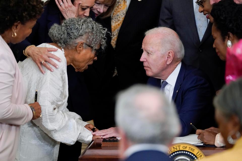 President Joe Biden speaks with Opal Lee after he signed the Juneteenth National Independence Day Act on June 17, 2021, in the White House.