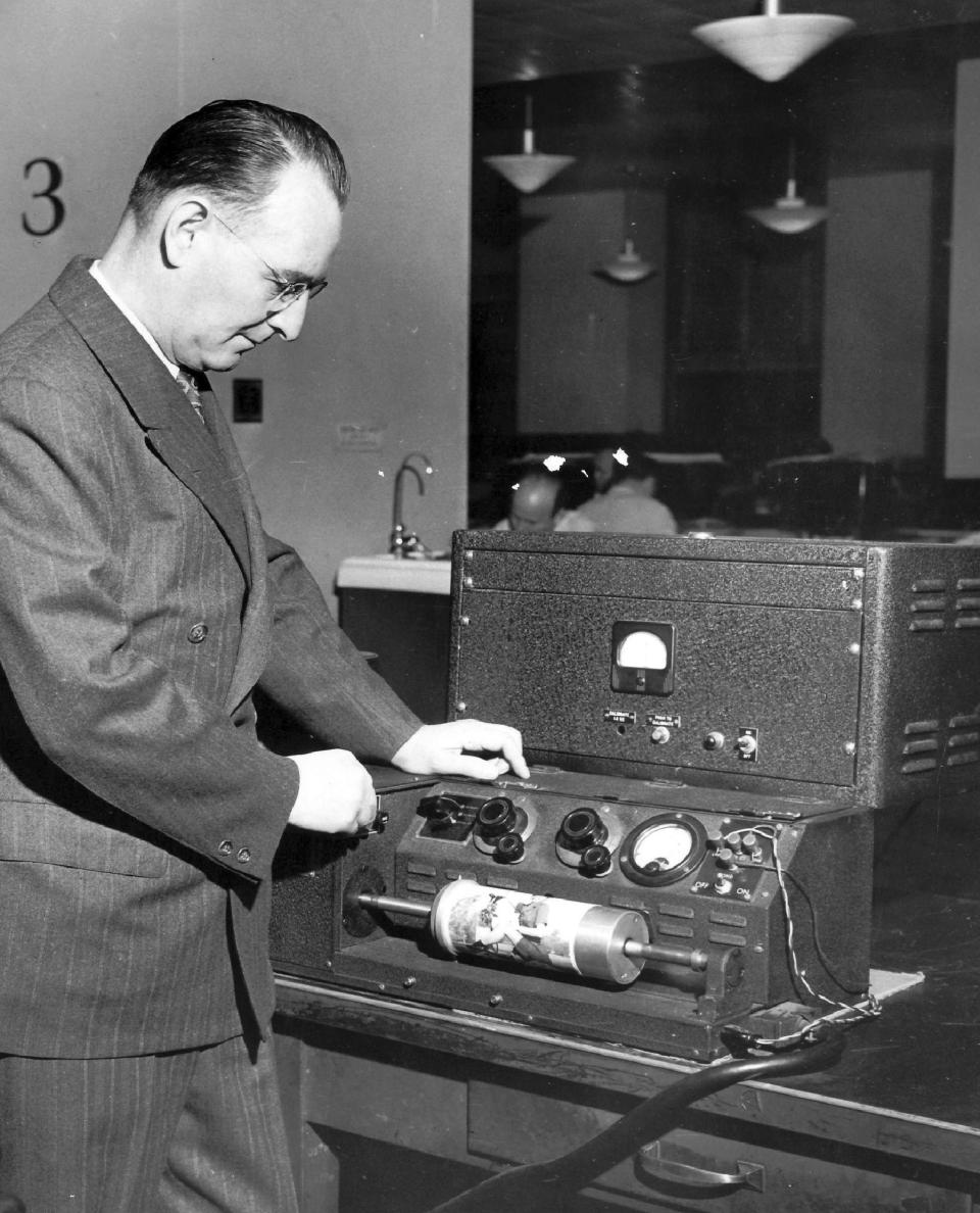 AP Wirephoto operator Harold King demonstrates transmission equipment at Associated Press headquarters in New York, circa 1950. The AP will muster a small army to cover King Charles III's coronation this weekend. For his mother's crowning 70 years ago, the wire service also enlisted the help of an air force. In 1953, it took eight minutes to transmit a single black-and-white photograph, provided the weather conditions and phone lines cooperated. So among the methods AP employed to deliver photos from London to its American newspaper clients was an arrangement to put them on Royal Air Force bombers. (AP Photo/Corporate Archives)