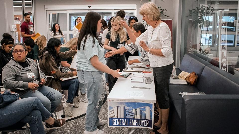 WT nursing studens fill out job applications and hope to be hired during a morning-long simulation of life in poverty held Oct. 11 in Harrington Academic Hall WTAMU Amarillo Center. The simulation teaches students to have empathy for their future patients and their life circumstances.