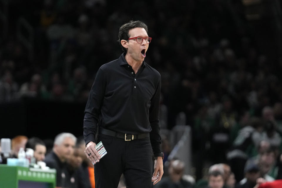 Atlanta Hawks head coach Quin Snyder shouts from the bench in the first half of an NBA basketball game against the Boston Celtics, Sunday, Nov. 26, 2023, in Boston. (AP Photo/Steven Senne)