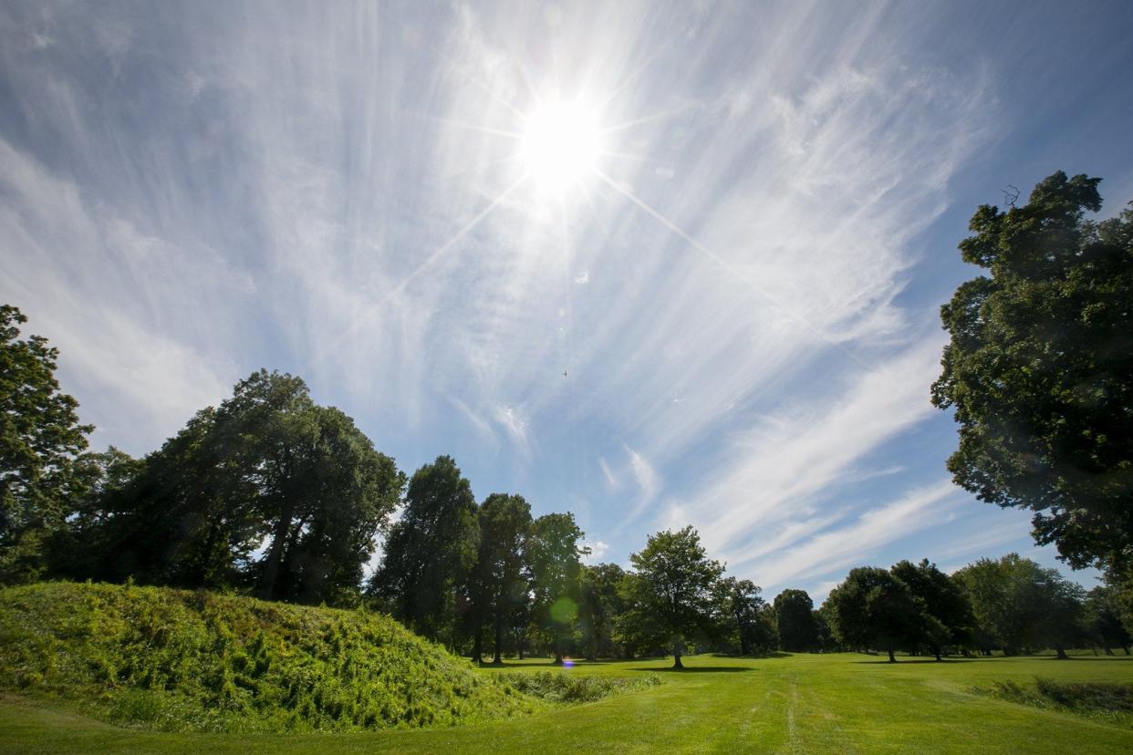 A 2020 photo of the sun shining over the Newark Earthworks