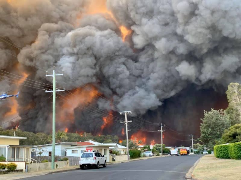 Smoke blankets a residential area in Harrington