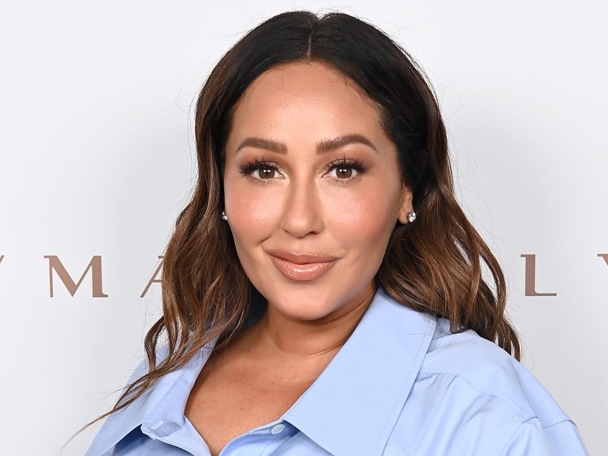 Adrienne Bailon-Houghton attends The LYMA Skincare LA Launch Event featuring Amber Valletta at Funke on July 13, 2023 in Los Angeles, California.