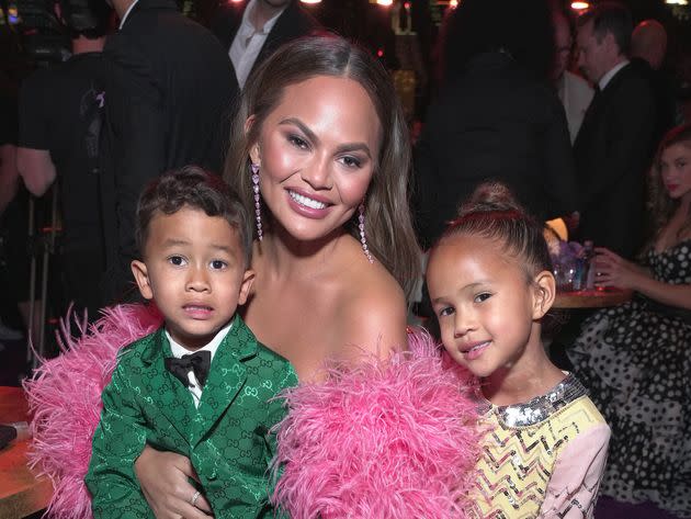Teigen with her children, Miles and Luna Stephens, at the Grammys in April. (Photo: Kevin Mazur via Getty Images)