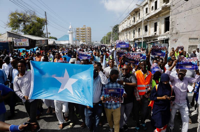 FILE PHOTO: Somali people march against the Ethiopia-Somaliland port deal, in Mogadishu