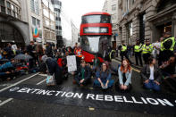 Demonstrators block traffic at Fleet Street during the Extinction Rebellion protest in London, Britain April 25, 2019. REUTERS/Peter Nicholls