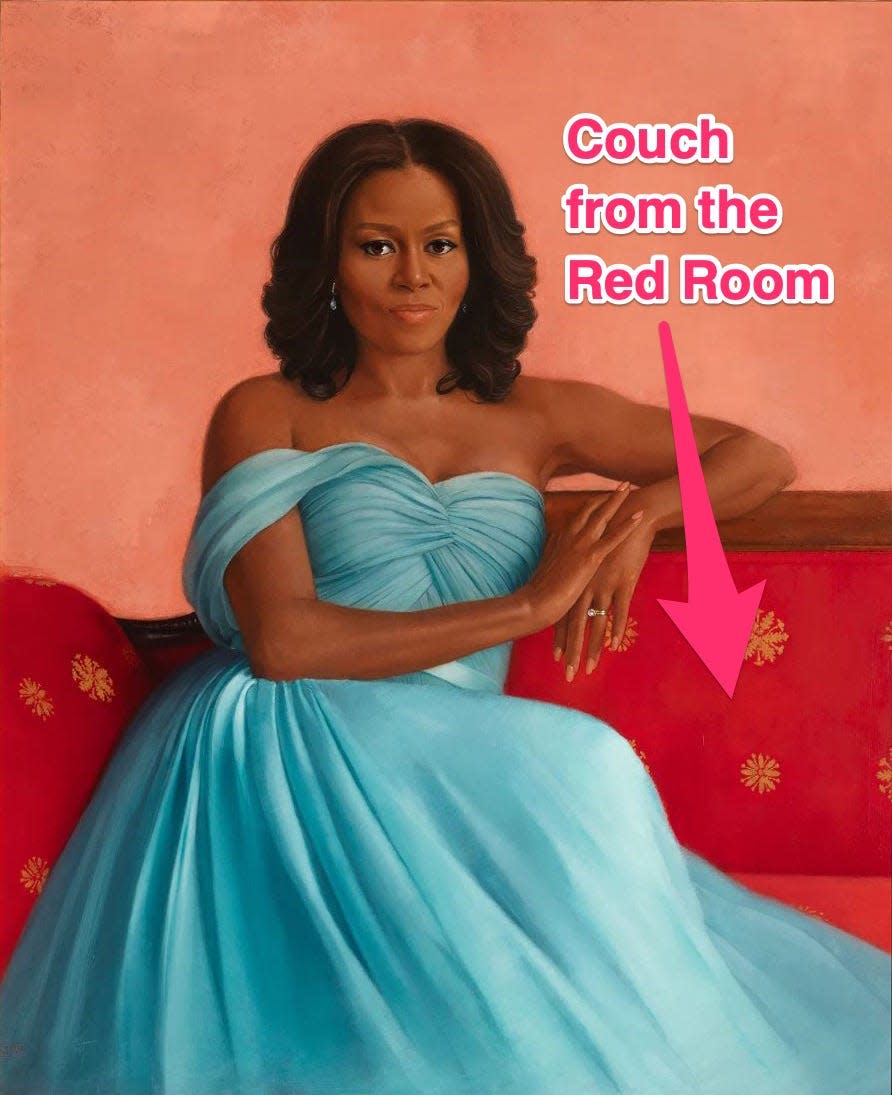 Michelle Obama's White House portrait with an arrow pointing to the couch.