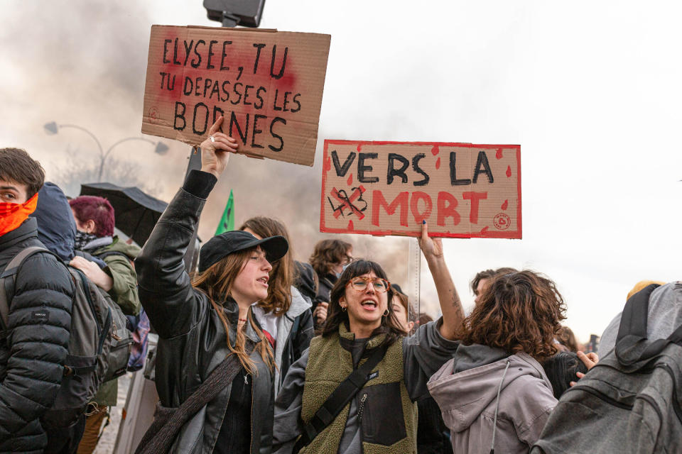 Protesters hold placards during a demonstration at the Place de la Concorde in Paris on March 16, 2023.<span class="copyright">Telmo Pinto—SOPA Images/LightRocket/Getty Images</span>