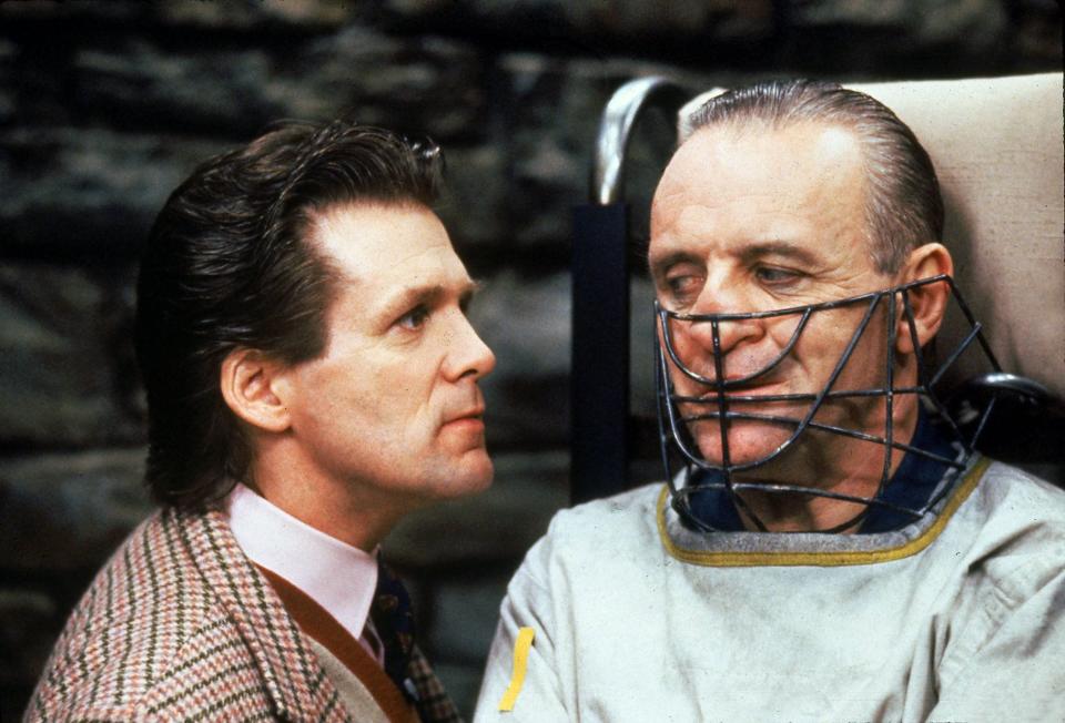 Anthony Hopkins (right, with Anthony Heald) is the cannibalistic serial killer – and horror icon – Hannibal Lecter in "The Silence of the Lambs."