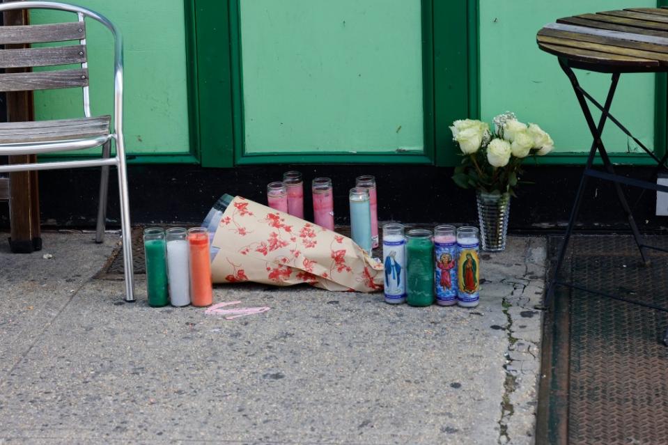 A memorial for McNally was set up outside the Ceili House pub after her murder there on Friday evening Kevin C. Downs for NY Post