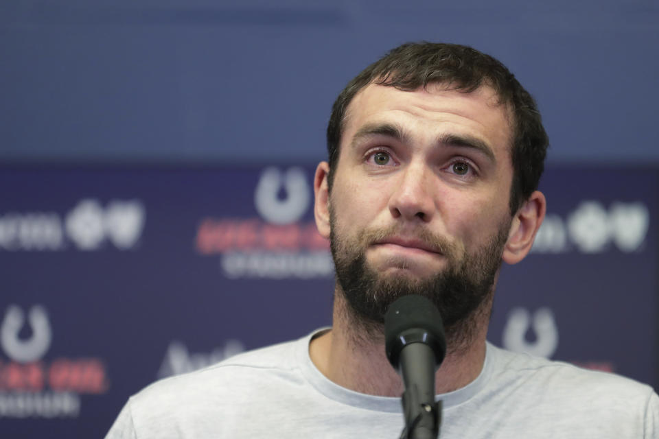 Indianapolis Colts quarterback Andrew Luck speaks during a news conference following the team's NFL preseason football game against the Chicago Bears, Saturday, Aug. 24, 2019, in Indianapolis. The oft-injured star is retiring at age 29. (AP Photo/Michael Conroy)