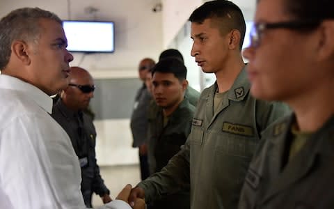 Defecting Venezuelan soldiers crossed the border into Colombia, where they met the president, Ivan Duque - Credit: Nicolas Galeano/Colombian Presidency