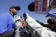 Retired NBA All-Star Tracy McGrady faces the media at the Sugar Land Skeeters baseball stadium Wednesday, Feb. 12, 2014, in Sugar Land, Texas. McGrady hopes to tryout for the independent Atlantic League Skeeters. (AP Photo/Pat Sullivan)