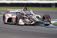 Rinus VeeKay, of the Netherlands, drives into an turn during a IndyCar auto race at Indianapolis Motor Speedway, Friday, Oct. 2, 2020, in Indianapolis. (AP Photo/Darron Cummings)