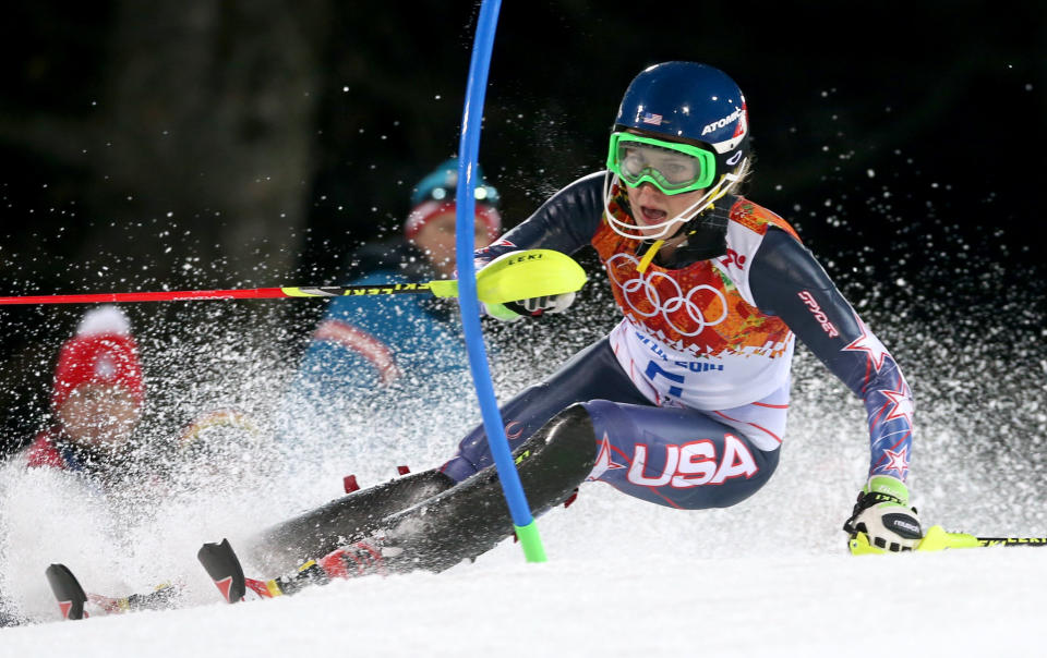 Gold medal winner Mikaela Shiffrin of the United States skis past a gate in the second run of the women's slalom at the 2014 Winter Olympics, Feb. 21, 2014, in Krasnaya Polyana, Russia.