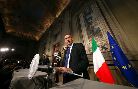 Former senior International Monetary Fund (IMF) official Carlo Cottarelli arrives to talk to the media after a meeting with Italy's President Sergio Mattarella at the Quirinal Palace in Rome, Italy, May 31, 2018. REUTERS/Alessandro Bianchi