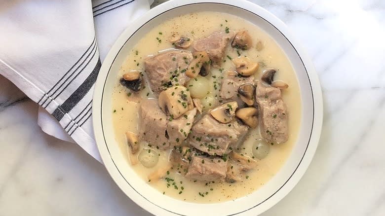 White meat stew in white bowl 