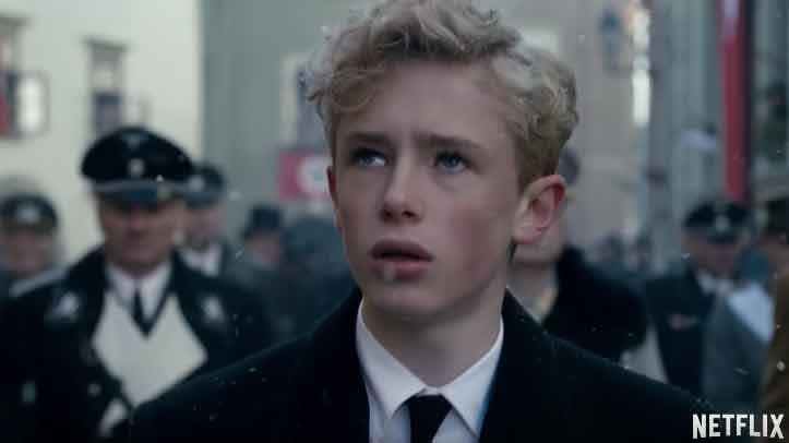 In The Crown, we see a 16-year-old Philip attending the funeral in Germany looking utterly distraught and the prince is reunited with his mother and father whom he was estranged from. Source: Netflix