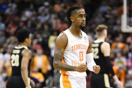 FILE PHOTO: Mar 28, 2019; Louisville, KY, United States; Tennessee Volunteers guard Jordan Bone (0) reacts during the second half in the semifinals of the south regional against the Purdue Boilermakers of the 2019 NCAA Tournament at KFC Yum Center. Mandatory Credit: Jamie Rhodes-USA TODAY Sports