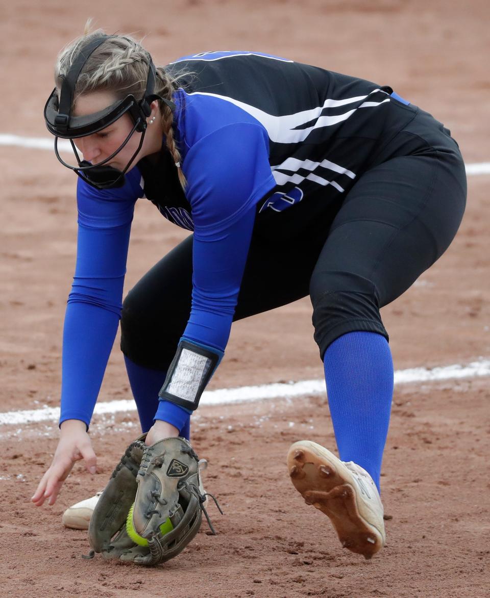 Oshkosh West's Chloe Tritt fields a ball during the Wildcats' game against Appleton North on April 21.