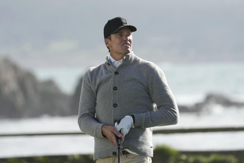 Former NFL quarterback Tom Brady watches his shot after hitting from the 18th tee at Pebble Beach Golf Links during the second round of the AT&T Pebble Beach National Pro-Am golf tournament in Pebble Beach, Calif., Friday, Feb. 2, 2024. (AP Photo/Eric Risberg)