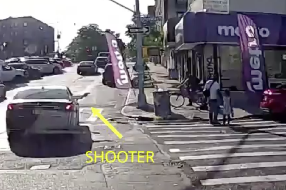 A gun was fired out of the car as the pair walked across the road (NYPD)