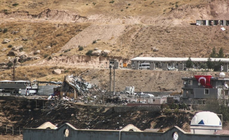 A picture taken on August 26, 2016 in Cizre, southeastern Turkey shows the destroyed police headquarters after a suicide truck bombing that killed eleven Turkish police officers and injured 78 people, in an attack blamed on Kurdish militants