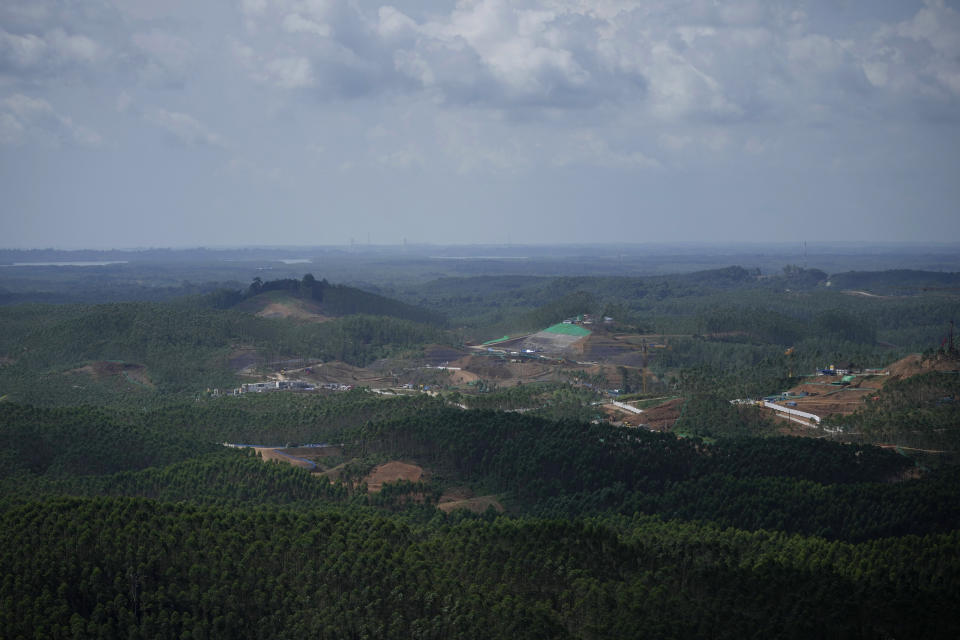 The construction site of the new capital city is seen from a hill in Penajam Paser Utara, East Kalimantan, Indonesia, Wednesday, March 8, 2023. Indonesia began construction of the new capital in mid 2022, after President Joko Widodo announced that Jakarta — the congested, polluted current capital that is prone to earthquakes and rapidly sinking into the Java Sea — would be retired from capital status. (AP Photo/Achmad Ibrahim)